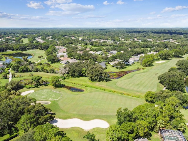 aerial view with view of golf course and a water view