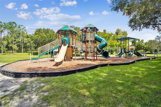 communal playground with a lawn