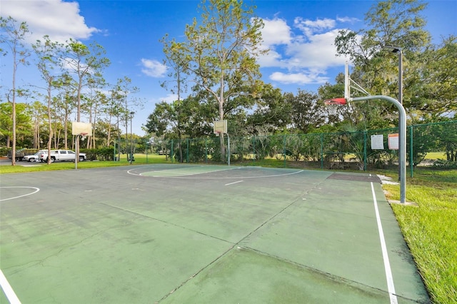 view of sport court featuring community basketball court and fence