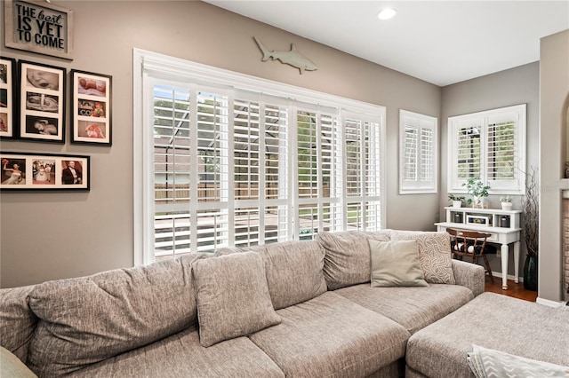 living area featuring wood finished floors and recessed lighting