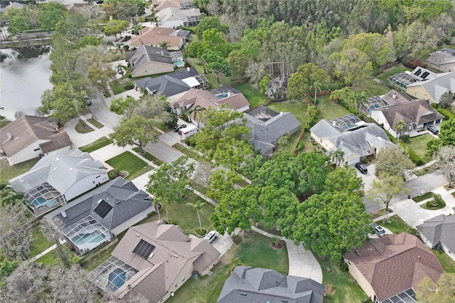 aerial view with a residential view and a water view