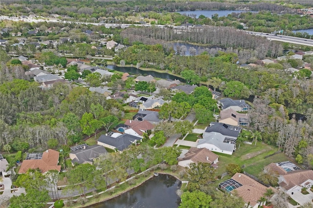 aerial view with a residential view and a water view