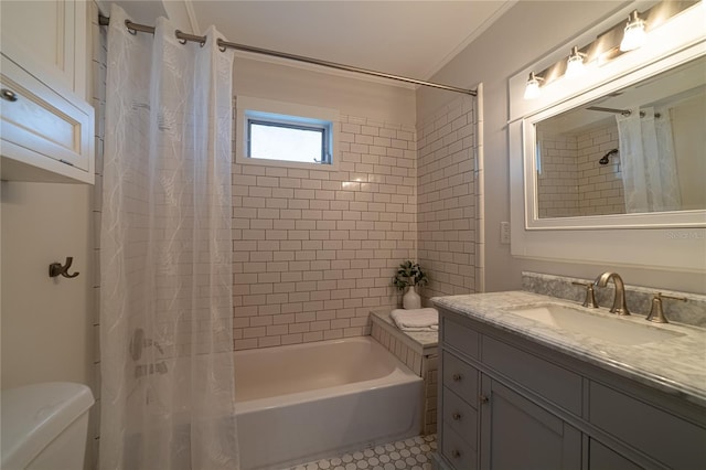 bathroom with vanity, shower / bath combination with curtain, and toilet