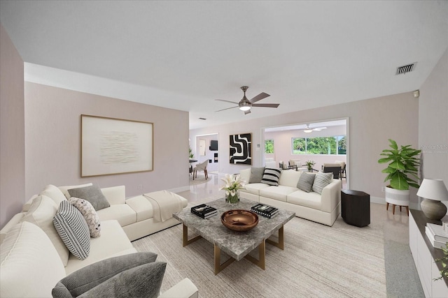 living room featuring baseboards, visible vents, and ceiling fan