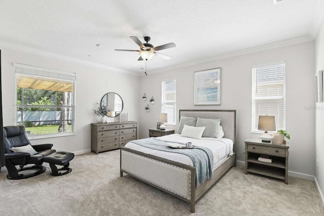 bedroom with baseboards, light carpet, a textured ceiling, and ornamental molding