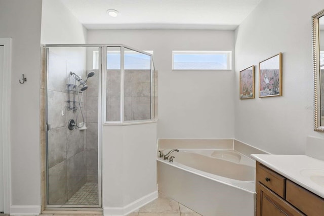 full bath with vanity, a shower stall, a bath, and tile patterned flooring