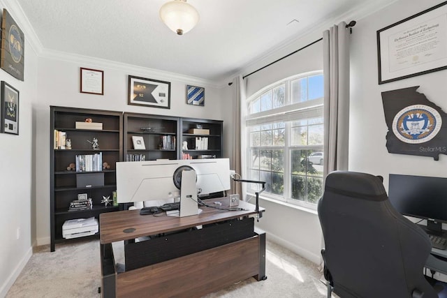 office with baseboards, light carpet, and ornamental molding