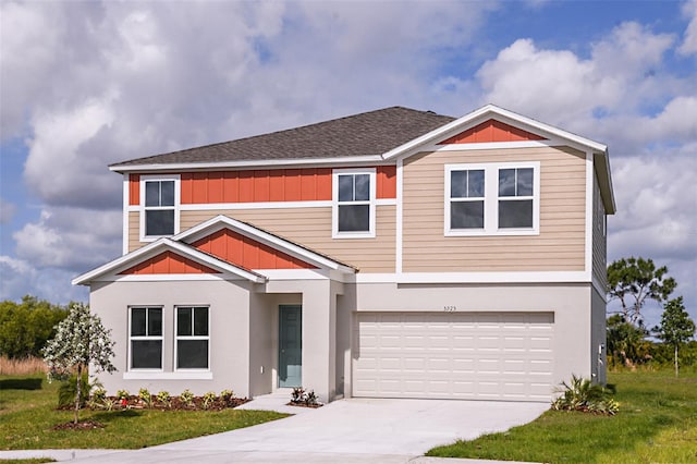 view of front of property featuring a front lawn, board and batten siding, concrete driveway, a shingled roof, and a garage