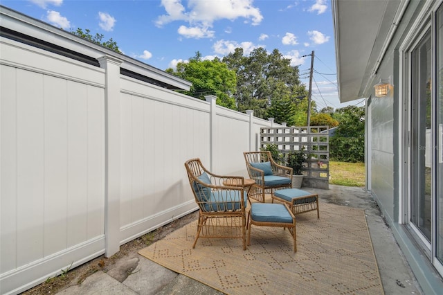 view of patio with fence