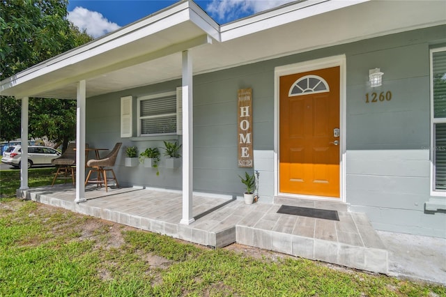 1260 S Hillcrest Ave, Clearwater, FL 33756 - view of exterior entry with a porch