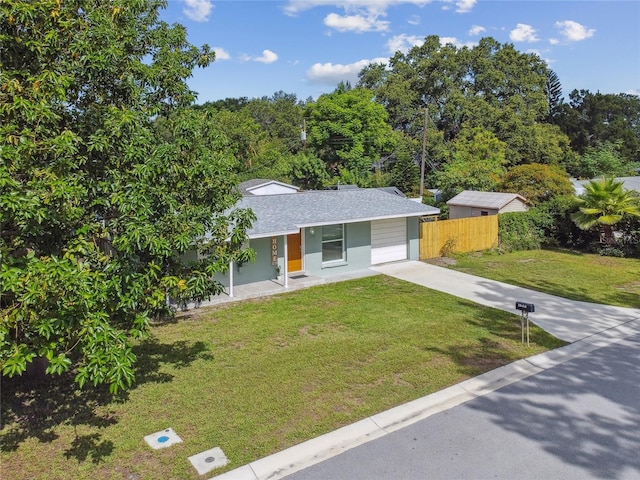 1260 S Hillcrest Ave, Clearwater, FL 33756 - view of front facade with driveway, roof with shingles, and a porch