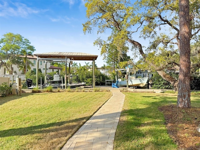 view of property's community with a yard