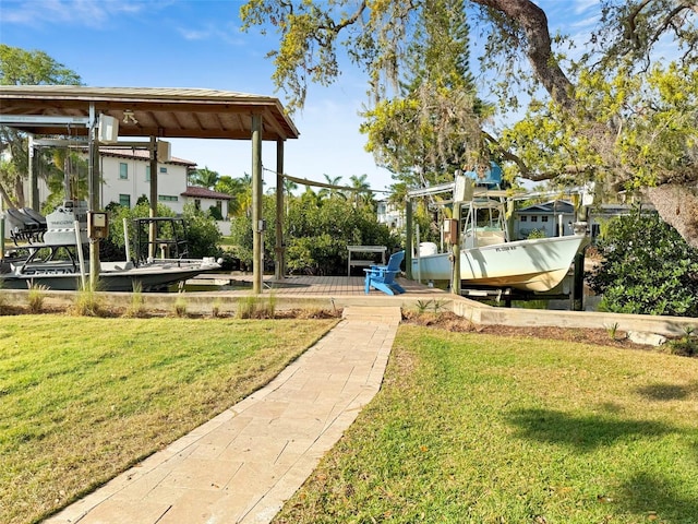 view of yard featuring a boat dock
