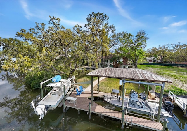 view of dock with boat lift and a water view