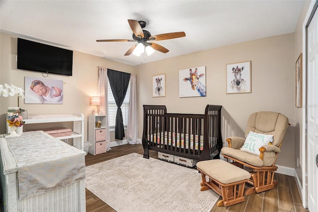 7116 Colonial Lake Dr, Riverview, FL 33578 - bedroom featuring baseboards, wood finished floors, and ceiling fan