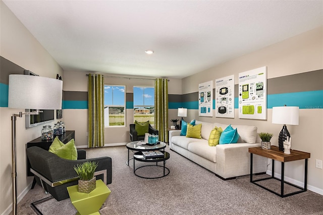 living area with baseboards and carpet floors