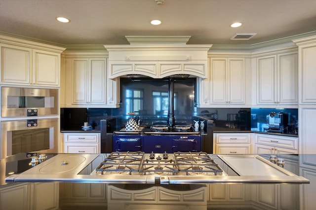 kitchen with visible vents, recessed lighting, and stainless steel double oven