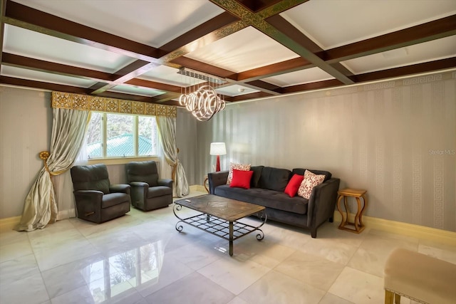 living area featuring wallpapered walls, baseboards, coffered ceiling, and a chandelier