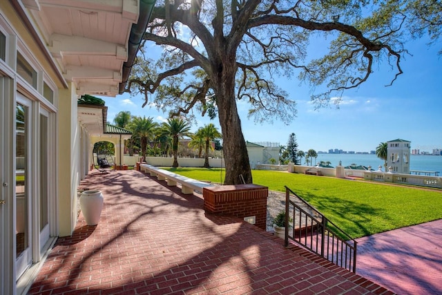 view of patio / terrace with a water view