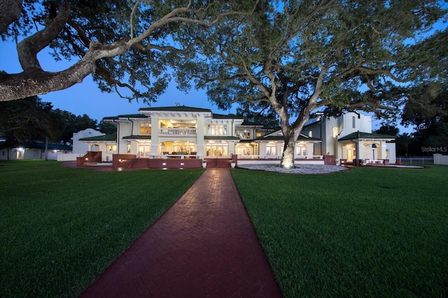 view of home's community with a lawn