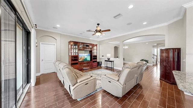 5324 Moon Shell Dr, Apollo Beach, FL 33572 - living area with arched walkways, baseboards, a ceiling fan, crown molding, and recessed lighting