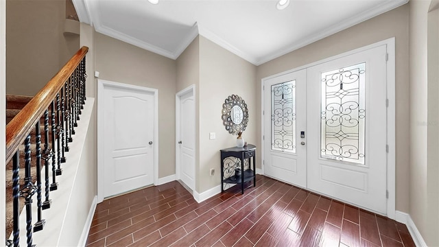 5324 Moon Shell Dr, Apollo Beach, FL 33572 - foyer entrance with baseboards, crown molding, recessed lighting, stairs, and dark wood-style floors