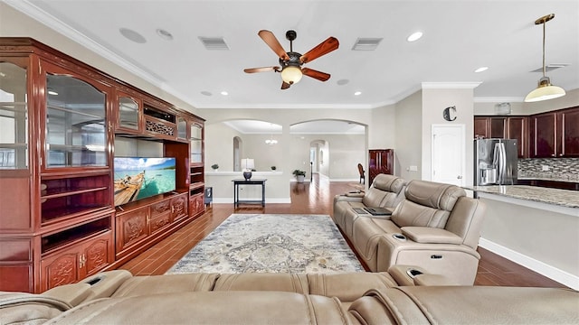 5324 Moon Shell Dr, Apollo Beach, FL 33572 - living area featuring arched walkways, a ceiling fan, ornamental molding, recessed lighting, and baseboards