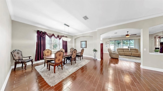 5324 Moon Shell Dr, Apollo Beach, FL 33572 - dining area featuring plenty of natural light, baseboards, dark wood finished floors, and ornamental molding