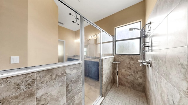 5324 Moon Shell Dr, Apollo Beach, FL 33572 - bathroom featuring a stall shower, vanity, and tile patterned flooring