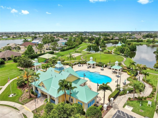 5324 Moon Shell Dr, Apollo Beach, FL 33572 - aerial perspective of suburban area featuring a nearby body of water and a pool area