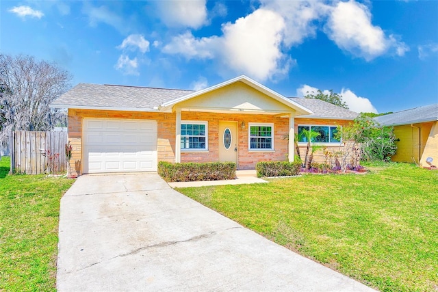 ranch-style house with driveway, a front lawn, an attached garage, and fence