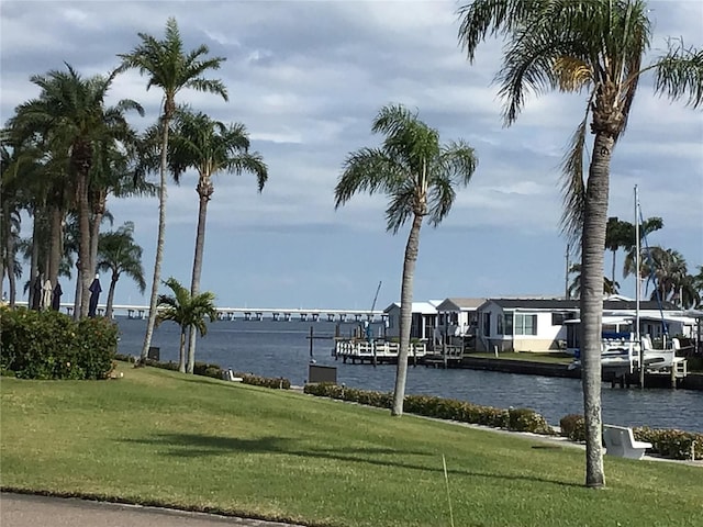 view of water feature with a dock