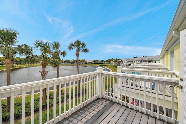 deck featuring a water view