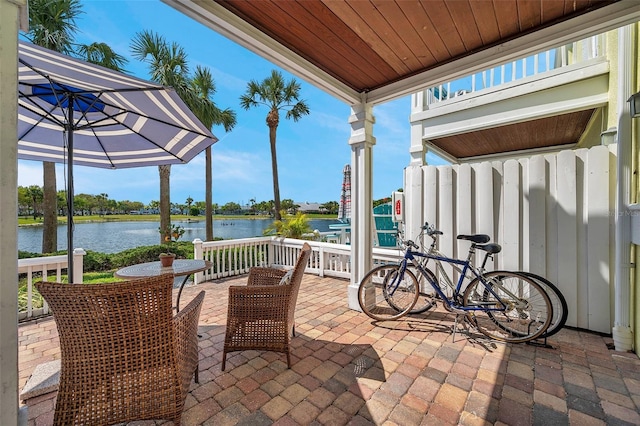 view of patio / terrace with a water view