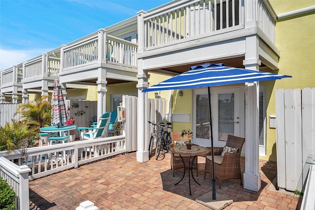 view of patio / terrace featuring fence