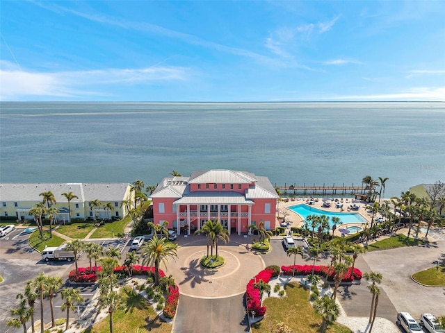 birds eye view of property featuring a water view