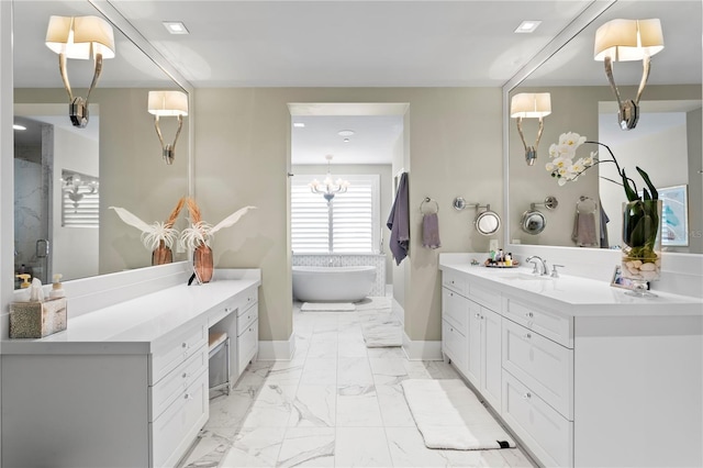 146 4th Ave NE Unit 600, Saint Petersburg, FL 33701 - bathroom featuring vanity, a freestanding tub, baseboards, marble finish floor, and a stall shower