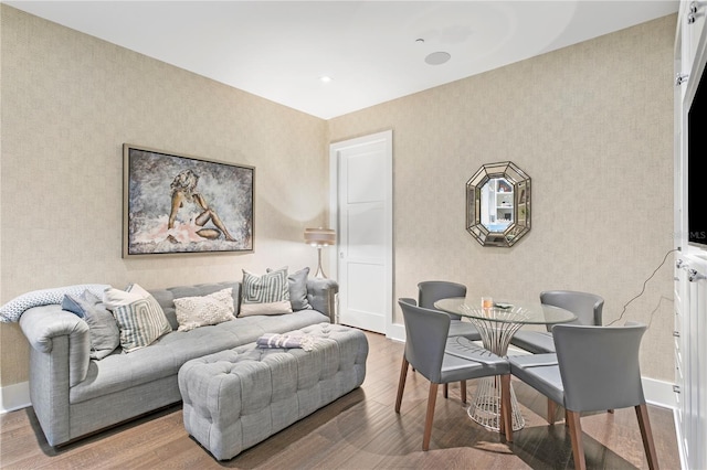 146 4th Ave NE Unit 600, Saint Petersburg, FL 33701 - living area featuring baseboards, wallpapered walls, and wood finished floors