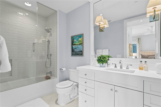 146 4th Ave NE Unit 600, Saint Petersburg, FL 33701 - full bath featuring toilet, tile patterned floors, vanity, and enclosed tub / shower combo