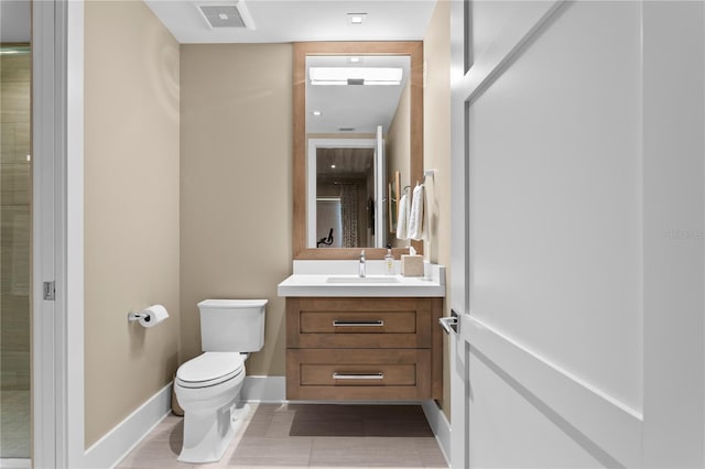 146 4th Ave NE Unit 600, Saint Petersburg, FL 33701 - bathroom with tile patterned flooring, vanity, toilet, baseboards, and visible vents
