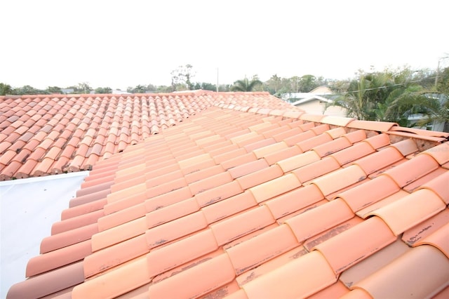 exterior details featuring a tiled roof