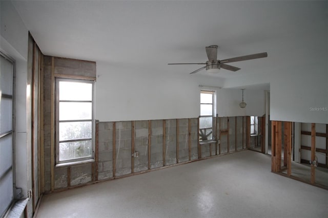 unfurnished room with a ceiling fan