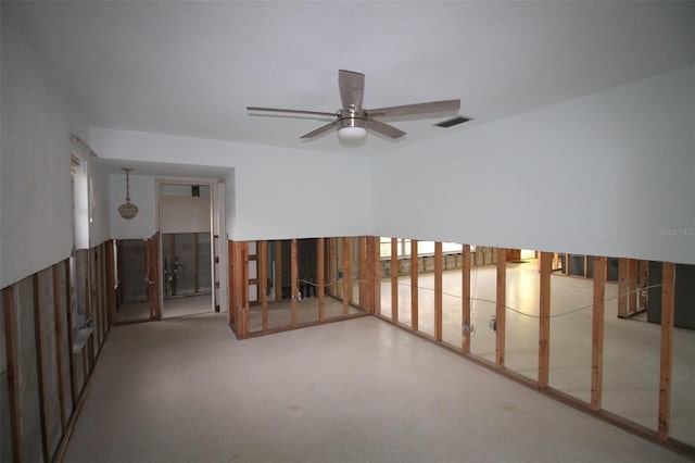 spare room with visible vents and a ceiling fan