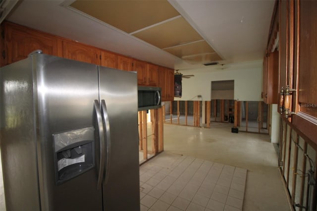 kitchen with stainless steel appliances and brown cabinets