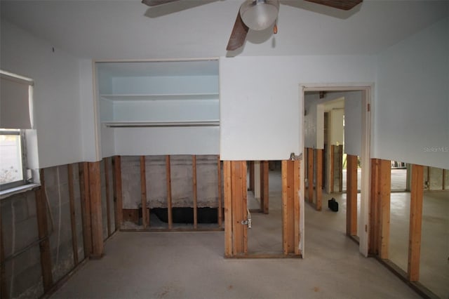 interior space featuring a ceiling fan