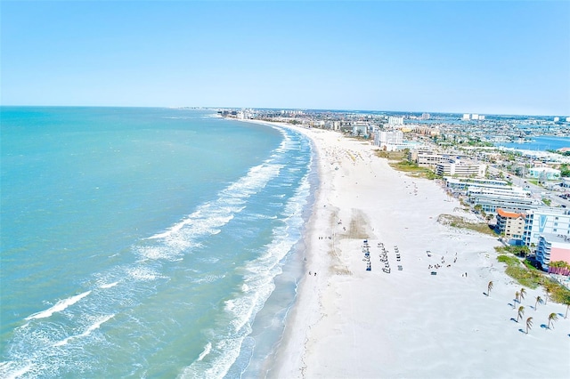 birds eye view of property featuring a water view, a city view, and a view of the beach