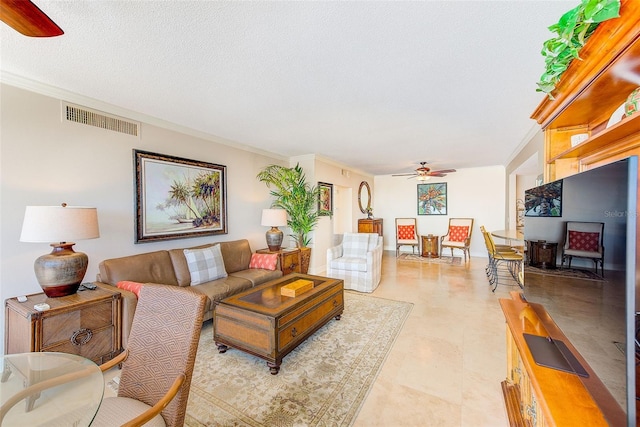 living room with visible vents, a textured ceiling, crown molding, and ceiling fan