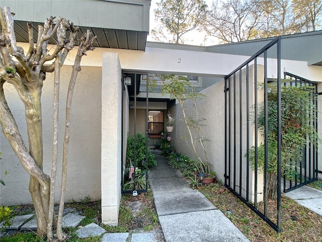 view of home's exterior with stucco siding