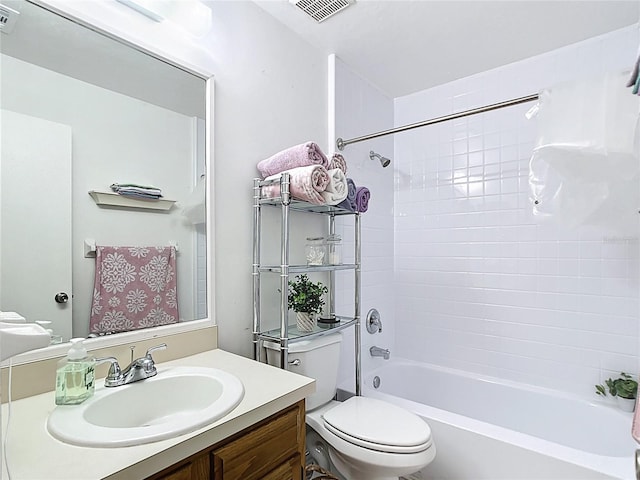 full bath featuring visible vents, shower / bathtub combination, toilet, and vanity