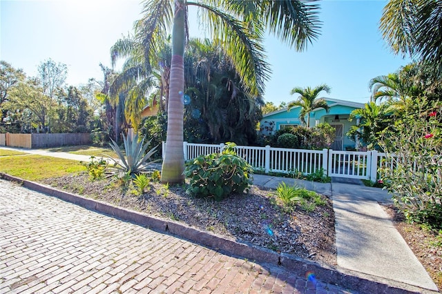 exterior space featuring a fenced front yard